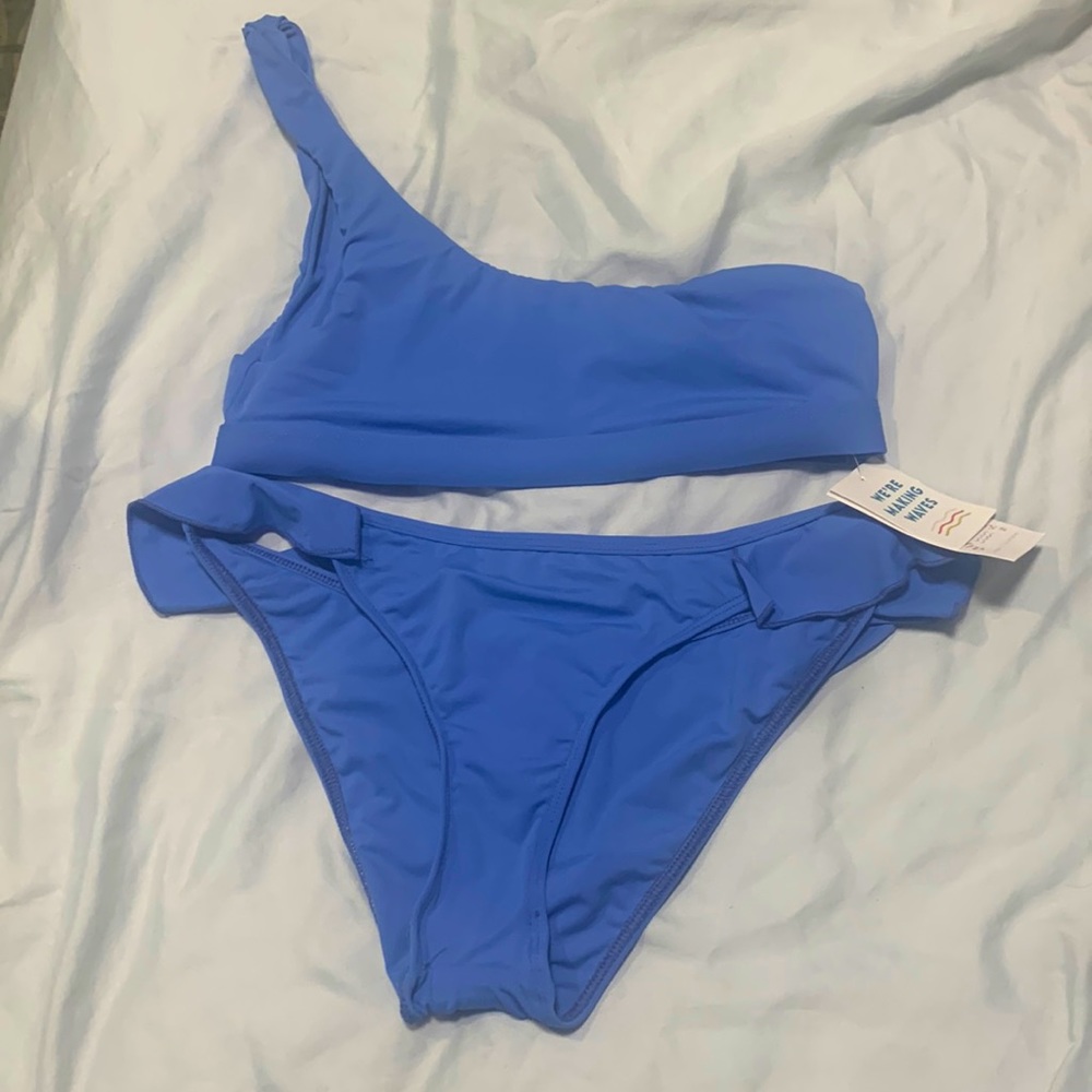 Brand new single strap dippin daisy suit